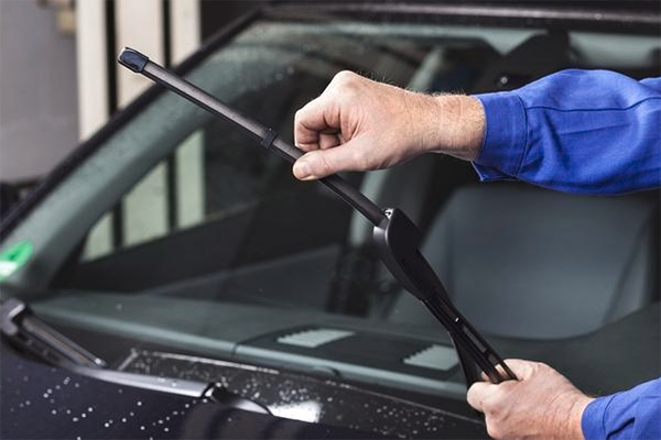 removing old and installing new Topex wiper blade