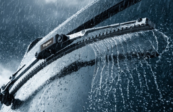 Topex heavy-duty wiper blade performing clear, strong wipe on a truck windshield in rain