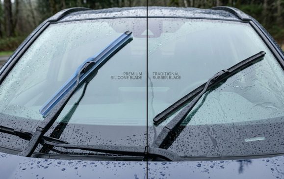Side-by-side comparison of silicone and traditional rubber wiper blades on a windshield