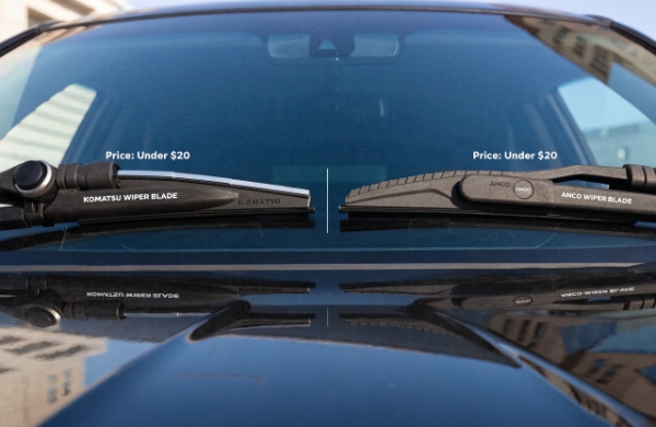 Realistic comparison of several budget wiper blades on a car windshield